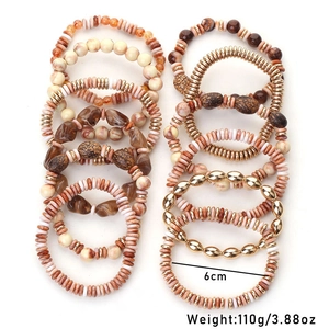 Detail view of 12-piece bohemian acrylic beaded bracelets with earth tones and 6cm diameter