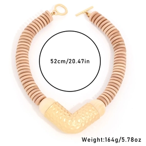 Ethnic V-shaped chunky necklace with light brown wooden beads and gold textured pendant