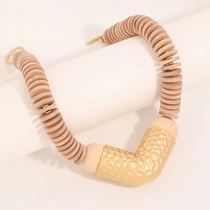 Minimalist V-shaped necklace with light wood beads and gold hammered metal tube