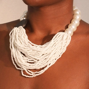 Bohemian multi-layer white seed bead and faux pearl chunky necklace on model