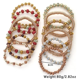 Detail showing twelve layers of bohemian beaded bracelets with 6cm diameter and 80g weight