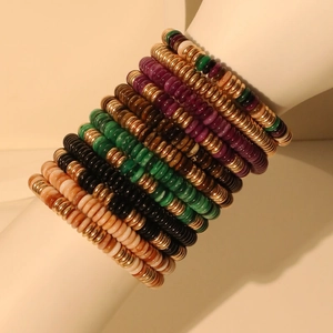 Multilayer bohemian beaded bracelet set featuring colorful acrylic and gold beads