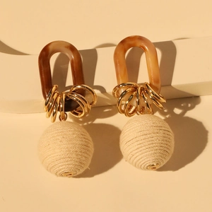 Handmade autumn round drop earrings with brown resin, gold rings and beige yarn balls