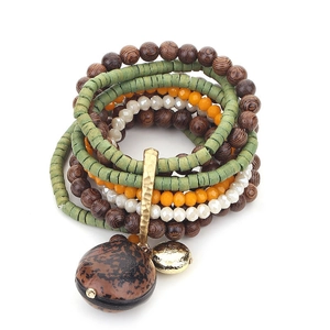 Bohemian multilayer wood beaded bracelet with spotted pendant on white background