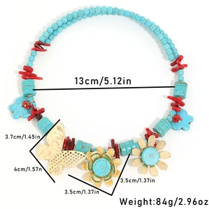 Bohemian beaded turquoise necklace with gold butterfly and floral charms, 84g weight