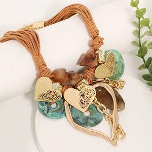 Bohemian woven rope necklace featuring a large heart pendant and colorful resin accents
