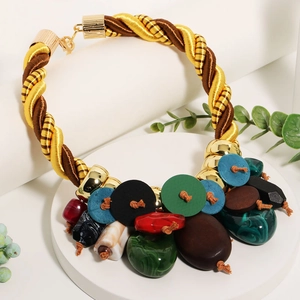 Bohemian style necklace with chunky twisted cord and colorful resin wood button pendants