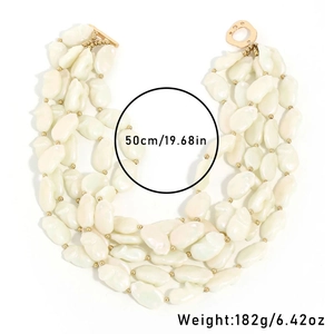 Detail of multi-layer baroque pearl necklace with gold toggle clasp, 50cm long