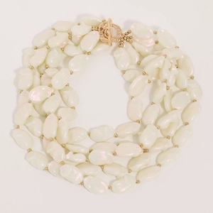 Multi-layer baroque pearl necklace with gold-tone T-bar clasp and spacer beads