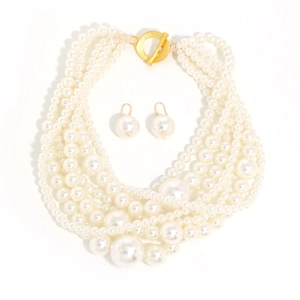 Elegant multi-layer pearl necklace and matching earrings set with golden toggle clasp