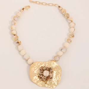 Beaded necklace with white brown marble texture beads and large gold hammered stone pendant