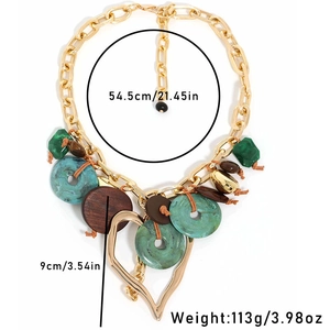 Bohemian gold chain necklace with oversized hollow heart pendant and resin marble beads