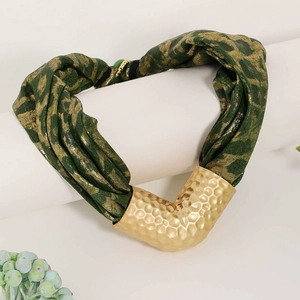Detail of V-shaped hammered gold metal tube on olive green leopard print fabric necklace