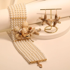 Handmade multi-layer pearl bracelet and starfish earring set with nautical shell charms