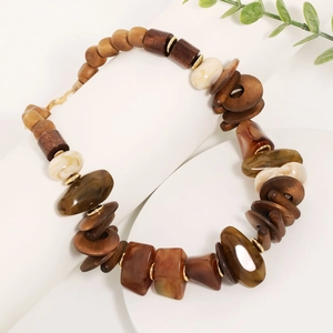 Handmade bohemian beaded necklace with wood, acrylic accents and gold-tone spacers