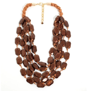 Collier long à plusieurs rangs en acrylique ambré avec perles à texture marbrée