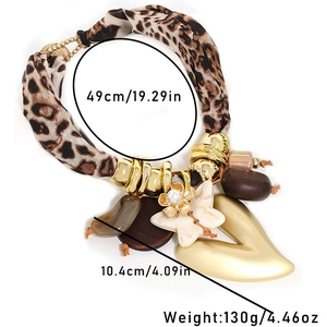 Leopard print fabric necklace with large heart butterfly pendant and size measurements