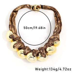 Detailed view of leopard fabric necklace with dimensions 50cm and weight 134g