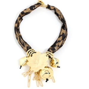 Bohemian leopard print fabric necklace with golden floral pendant and metallic tassels