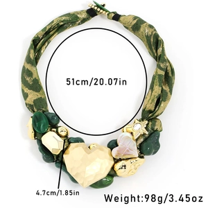 Detail view of vintage leopard ribbon necklace with golden heart pendant and measurements