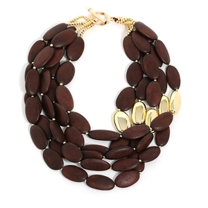 Multilayer beaded necklace with dark wood beads and gold metal accents with a toggle clasp