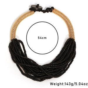 Detail view of multilayer black beaded necklace with size 54cm and weight 143g labels