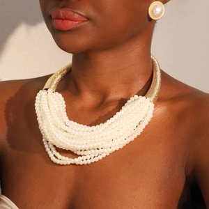 Exaggerated multilayer pearl necklace and earring set with golden metallic choker
