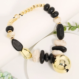Retro mixed bead necklace with gold balls, white marble beads and chunky pendant