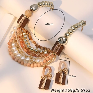 Macro view of multi-layered pearl and wood bead necklace with dimensions and weight info