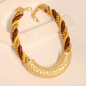 Golden hammered U-shaped chunky twisted cord necklace with a bohemian minimalist design
