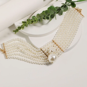 Elegant multi-layer pearl necklace set with gold accents for luxury evening wear