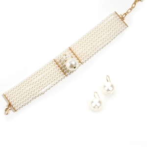 Elegant multi-layer pearl necklace and earring set with luxury gold accents for formal wear