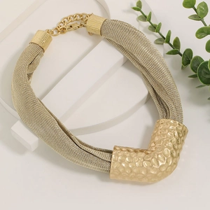 Golden multi-layer mesh chain necklace featuring a curved hammered texture metal pendant