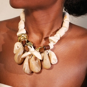 Bohemian woven rope necklace with teardrop resin pendant and vintage ethnic beads