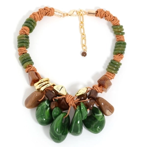 Detail of bohemian necklace with malachite water drop pendant and woven rope cord