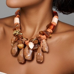 Bohemian woven rope necklace with amber resin beads and teardrop malachite pendant