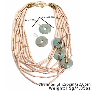 Detail view of multi-layer beaded necklace with green marble pendants and size specs