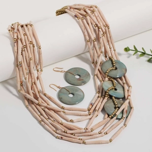 Bohemian multi-layer beaded necklace set with cream tubes and turquoise stone accents