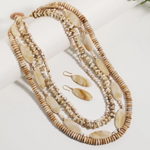 Exotic multi-layer beaded necklace and matching oval earrings set with marble texture