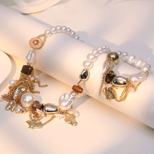 Bohemian pearl and shell necklace set with golden fringe chain and elegant pendants