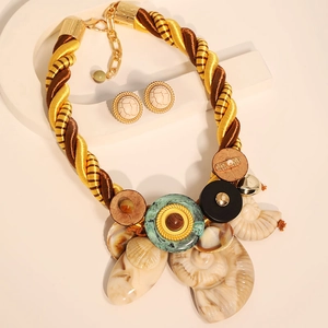 Bohemian gold rope necklace set with shell pendants and turquoise resin accents