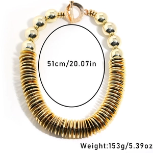 Detailed view of layered gold disk necklace with T-bar clasp, 51cm length and 153g weight