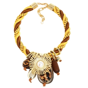 Vintage golden rope necklace with sunburst pendant, pearl accents, and leopard resin beads