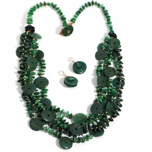 Detail of multi-layer beaded necklace and earrings set with green malachite stones