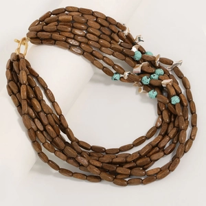 Multilayer deep brown wooden bead necklace with blue accents and gold T-bar toggle clasp