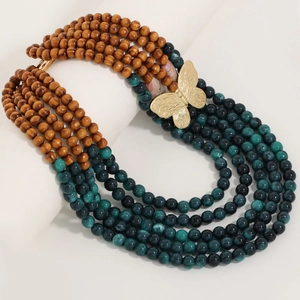 Bohemian multi-layer necklace with wooden beads, green acrylic stones and gold butterfly