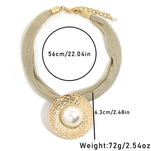 Detail of gold mesh chain necklace with hammered pendant and dimensions annotation