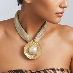Golden mesh chain necklace with a hammered pendant featuring a large faux pearl center