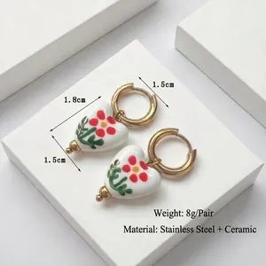 Elegant 18K gold plated stainless steel heart ceramic earrings with floral patterns