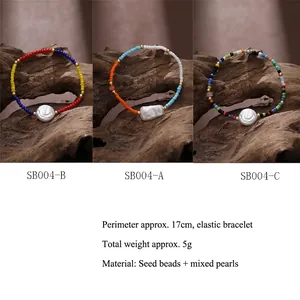 Bohemian colorful seed bead and pearl stretch bracelets for women on wood background